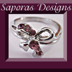 Size 6 Silver Tone Bow Design Ring With Pink Crystals